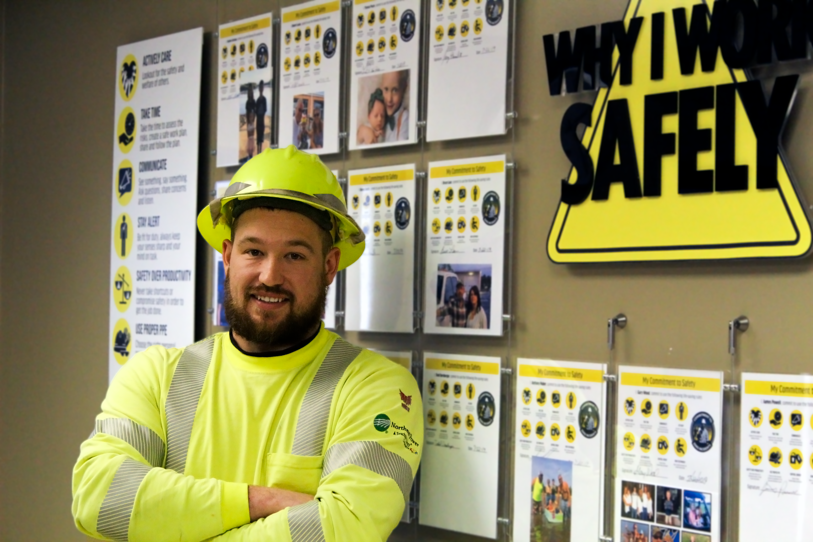 employee in front of safety wall
